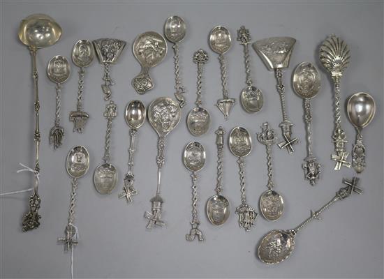 A set of 12 Dutch silver souvenir coffee spoons, various decorative preserve, caddy and other spoons and a toddy ladle 14.2oz. gross, (